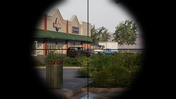 A circular rifle scope view aimed across an outdoor parking area.
